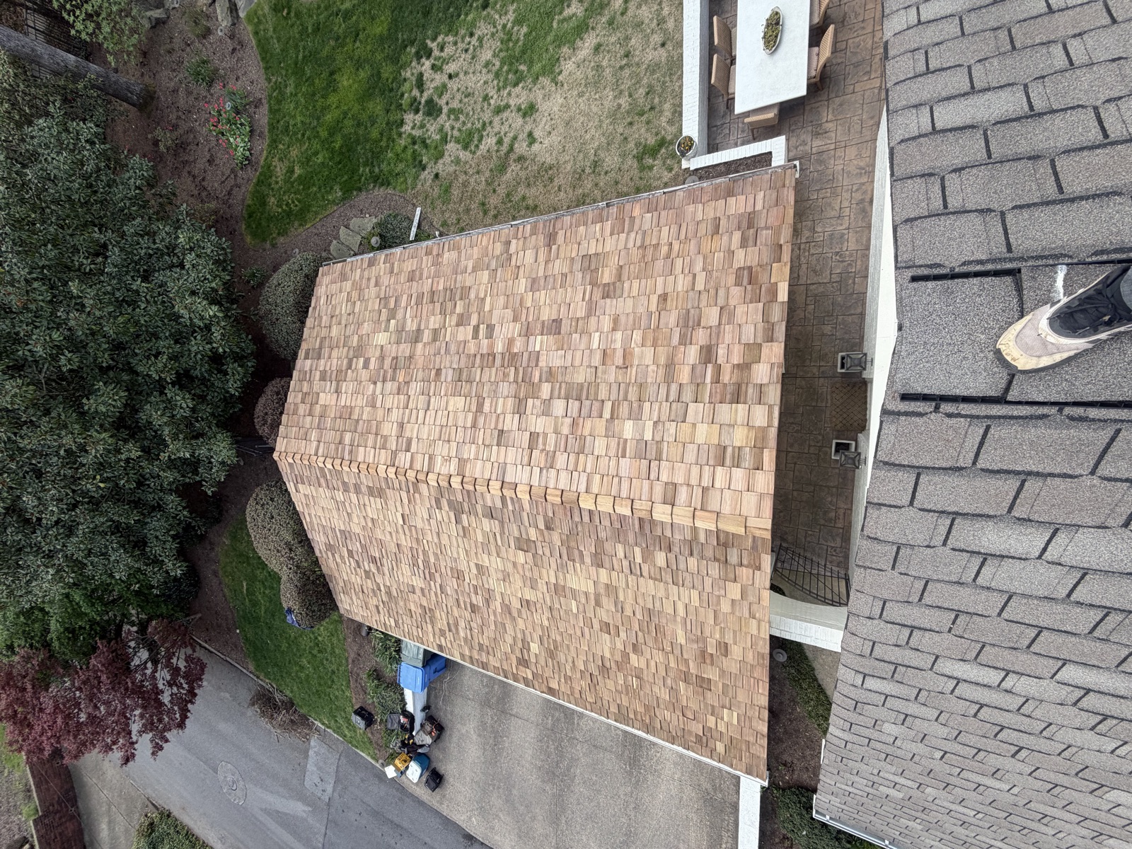 New architectural shingles next to home siding