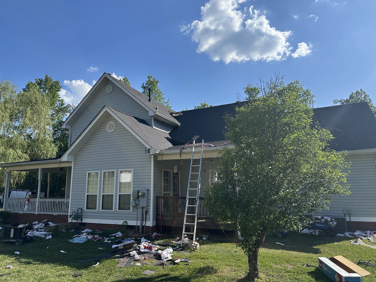 HB Contracting crew and truck on a residential roofing job site