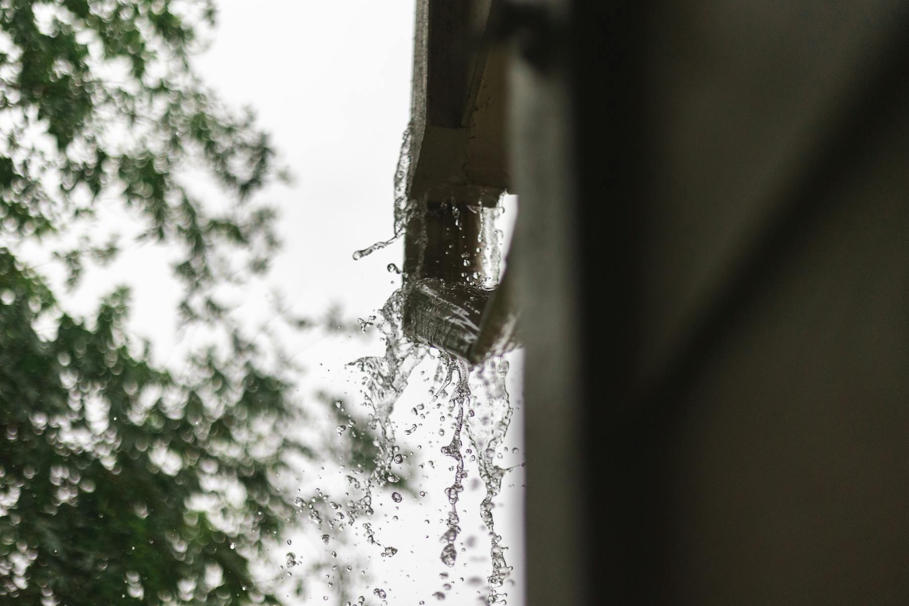 Gutter overflowing during heavy rainfall